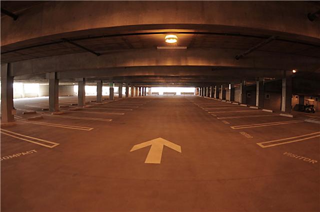 CMC parking structure directional arrows on interior deck