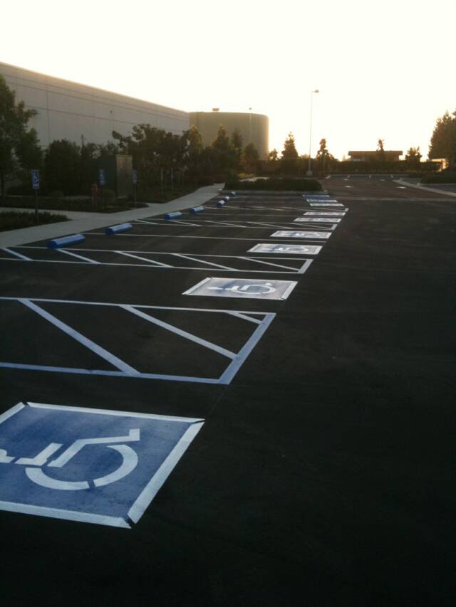 Freshly painted ADA-compliant accessible parking stalls at Kaiser Selma
