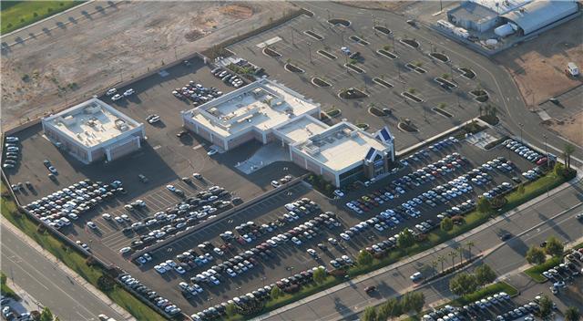 CarMax dealership parking lot striping aerial view in Fresno